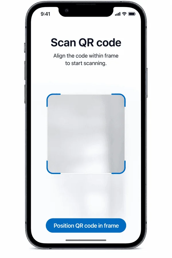 Phone showing the QR scanner: align the vehicle’s QR code inside the on-screen frame